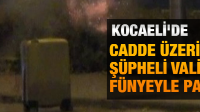 Kocaeli'nin İzmit ilçesinde otobüs durağının karşısında bırakılan şüpheli valiz fünyeyle